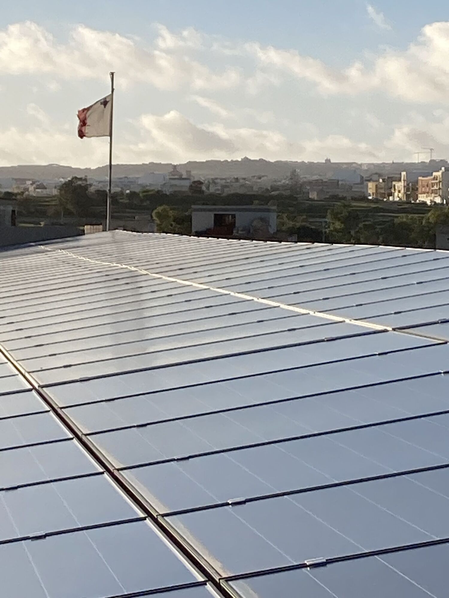 Maltese flag and solar panels